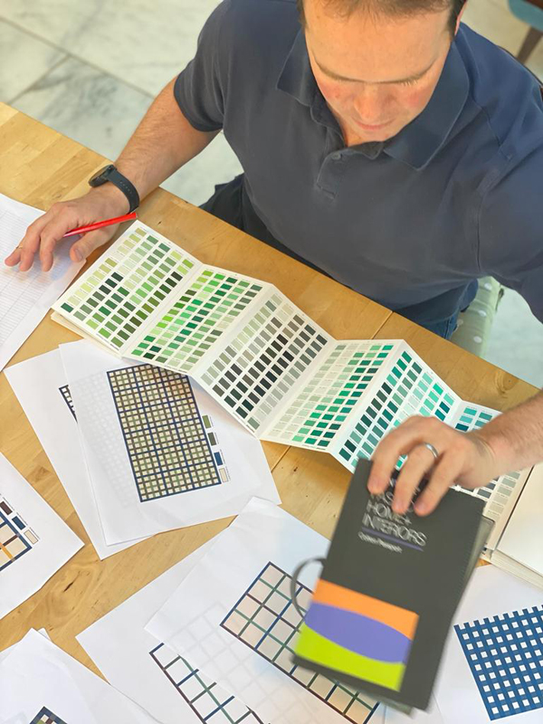 Bruce going through the Pantone booklet and choosing the final colourways